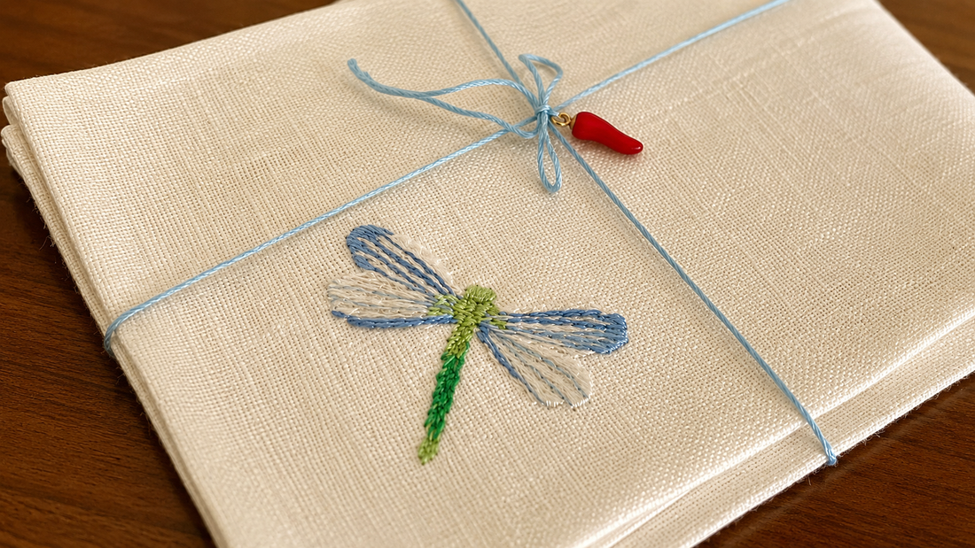 Light Italian embroidery on pure linen napkin with blue thread and handmade detail