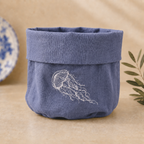 Blue resin-coated linen basket with off-white jellyfish embroidery by MI RE LA