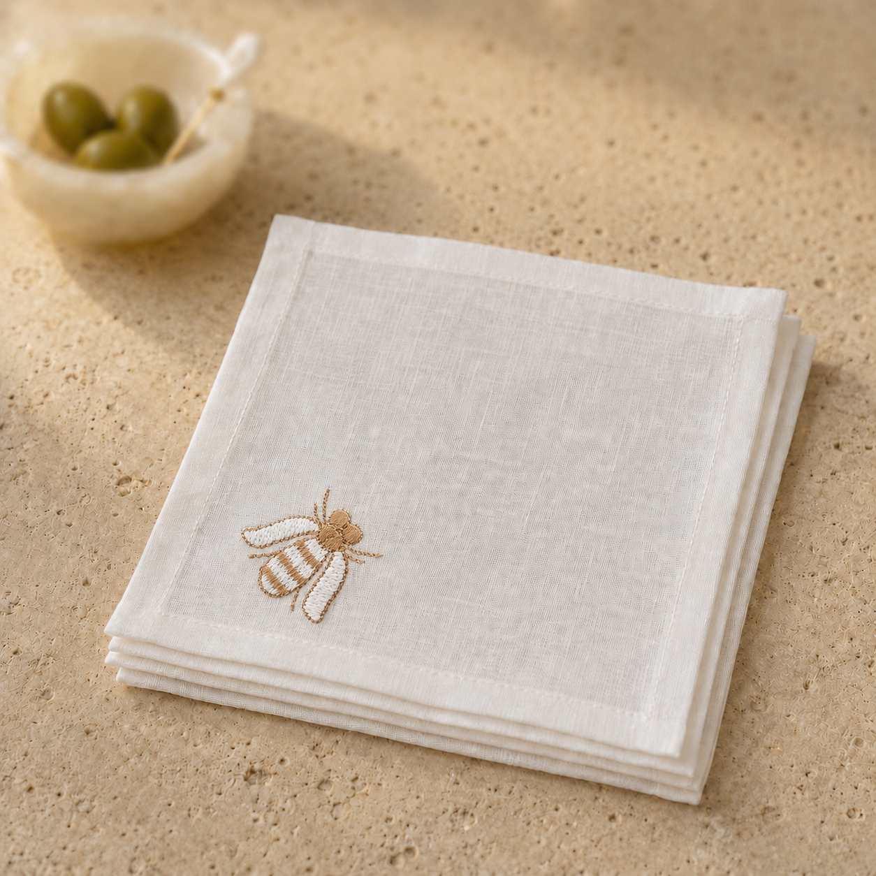 Off White classic linen cocktail napkin with brown bee embroidery by MI RE LA
