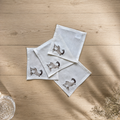 Tovaglioli da cocktail Cortina Stambecco color bianco sporco — set da 4 pezzi