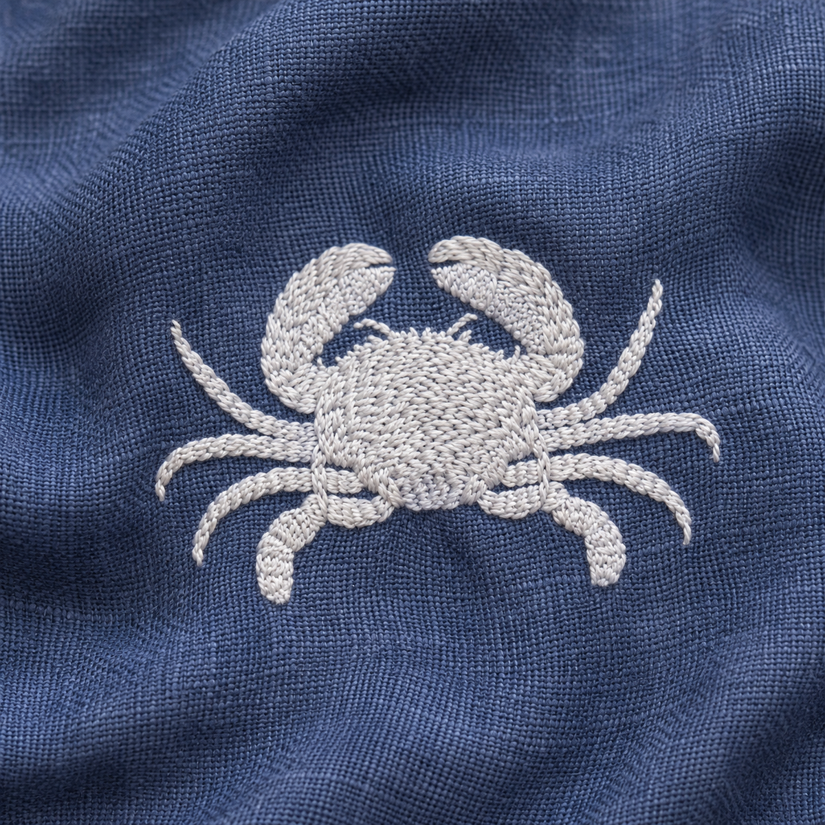 Off-White crab embroidery on Mediterranean Blue linen