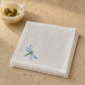 Off-white classic linen cocktail napkin with dragonfly blue embroidery by MI RE LA