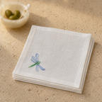 Off-white classic linen cocktail napkin with dragonfly blue embroidery by MI RE LA