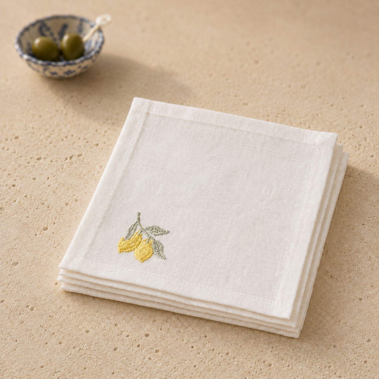 Off-white classic linen cocktail napkin with yellow lemon embroidery by MI RE LA
