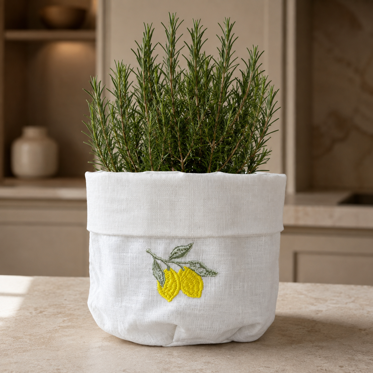 Coated linen basket with lemon embroidery on off-white