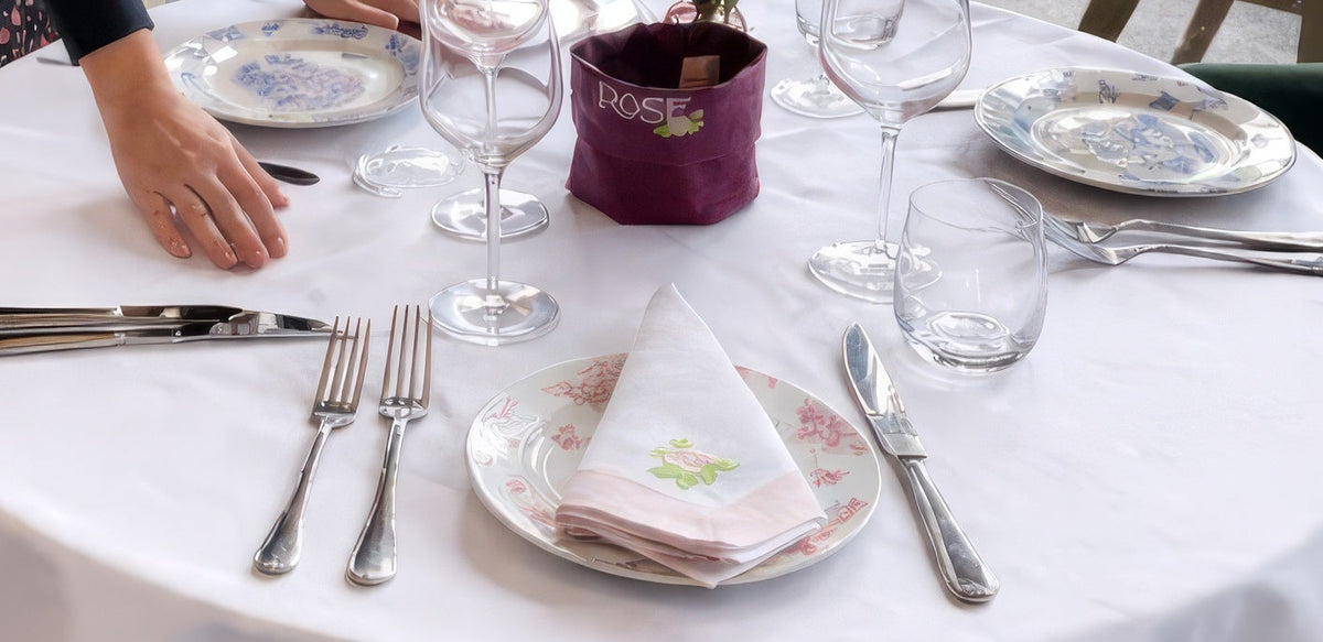 Custom bread baskets and embroidered napkins at Rose Cafe and Restaurant