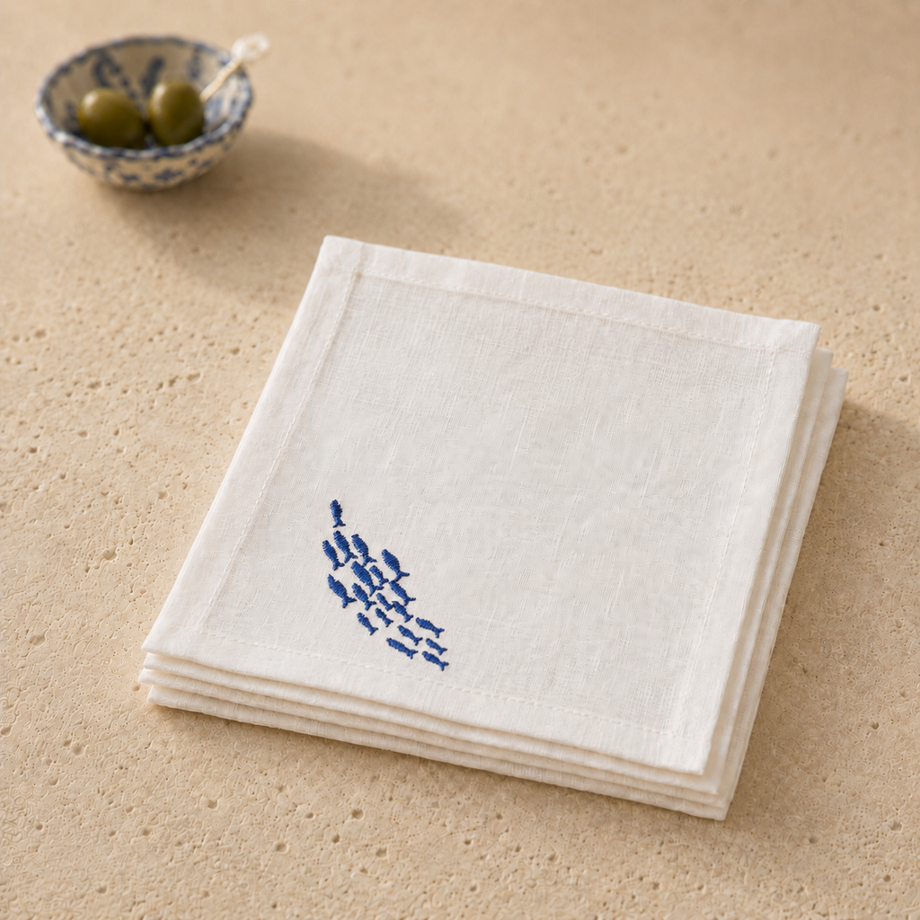 Off-white classic linen cocktail napkin with blue sardine embroidery by MI RE LA