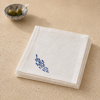 Off-white classic linen cocktail napkin with blue sardine embroidery by MI RE LA