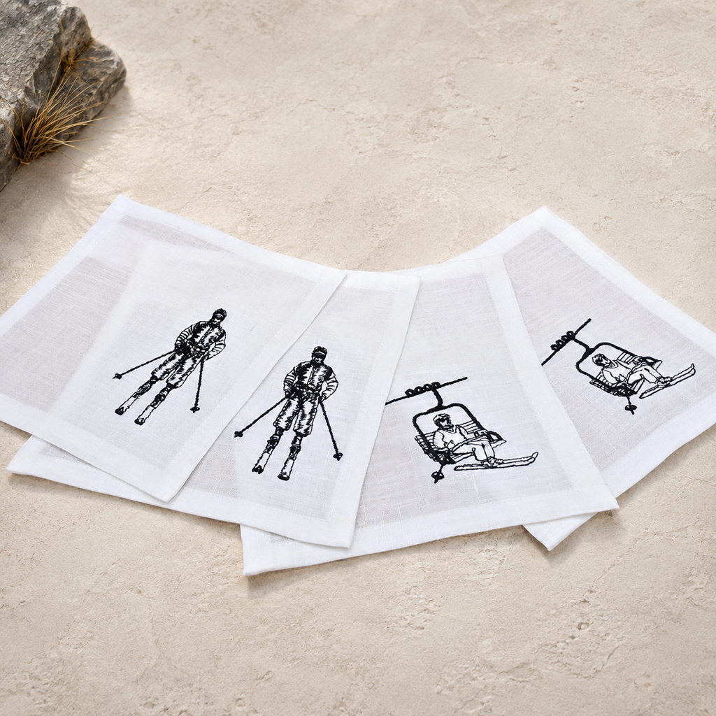 Tovaglioli da cocktail Cortina con sciatore color bianco panna — set da 4 pezzi