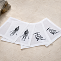 Tovaglioli da cocktail Cortina con sciatore color bianco panna — set da 4 pezzi