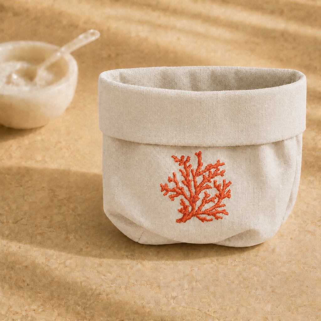 Oatmeal stone resin-coated linen basket with orange coral embroidery by MI RE LA