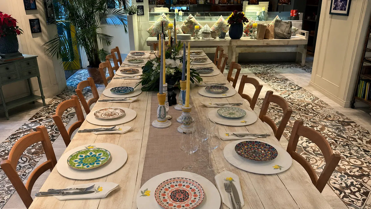 Custom MI RE LA placemats and embroidered lemon napkins at Call Me Gaby in Miami Beach