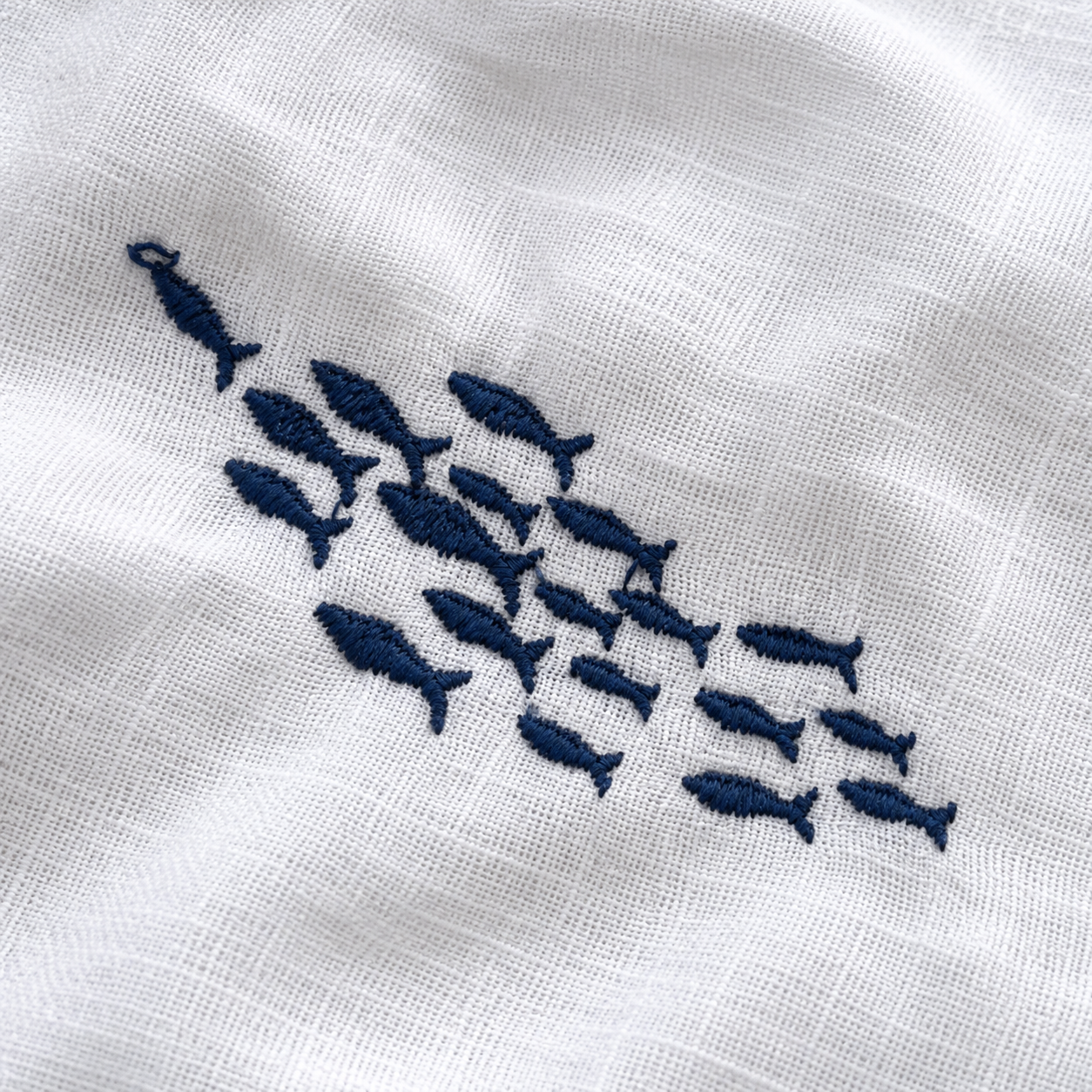 Mediterranean Blue fish embroidery on Off-White linen from Collezione Amalfi