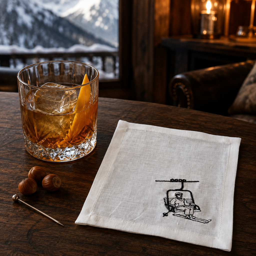 Tovaglioli da cocktail Cortina con sciatore color bianco panna — set da 4 pezzi